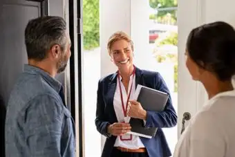 Osborne Homes specialist meet with homeowners at house