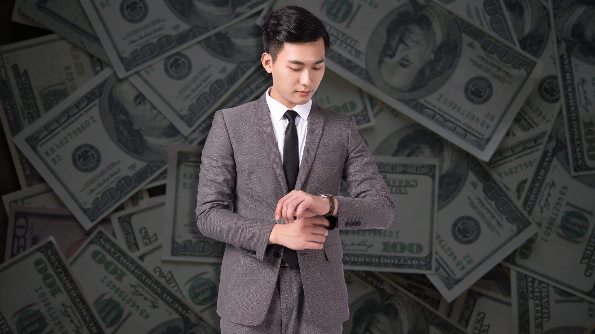 Young aspiring Los Angeles realtor looking at watch for time