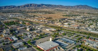 Aerial Fairfield neighborhood view with community park and baseball field, illustrating Osborne Homes’ Fairfield buying area.