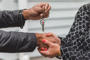Handing over keys in a wholesale real estate transaction in California