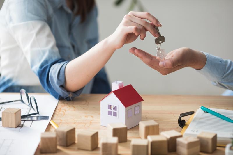 Handing over house keys after cash sale to Osborne Homes.