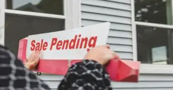 Under contract vs pending real estate sign in California sale