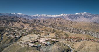 Aerial Rancho Mirage neighborhoods with mountains, highlighting Osborne Homes’ local service area for sellers.