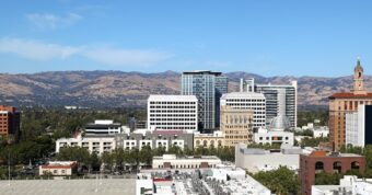 San Jose downtown skyline with surrounding mountains, showcasing Osborne Homes’ reach across San Jose communities.