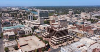 An oblique aerial view of downtown Stockton, California. We buy houses in Stockton, CA!