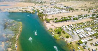 Aerial view of Blythe, California, a waterfront community with houses we buy for cash along the Colorado River.