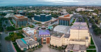 Aerial view of Cerritos, California, Towne Center, and residential areas where we buy houses for cash fast.
