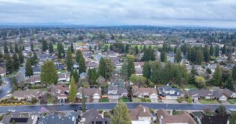 Aerial view of a Roseville, California residential neighborhood showing Placer County homes purchased by cash buyers.