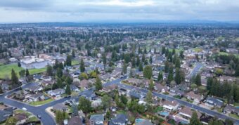 Aerial view of Roseville California residential neighborhoods showing Placer County homes purchased by cash buyers.